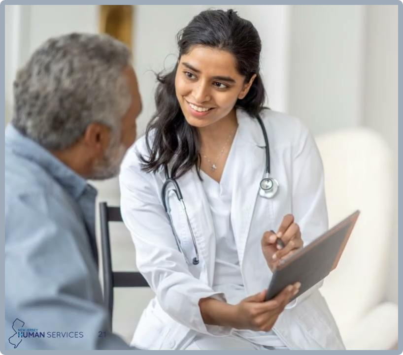 A physician consults with a patient